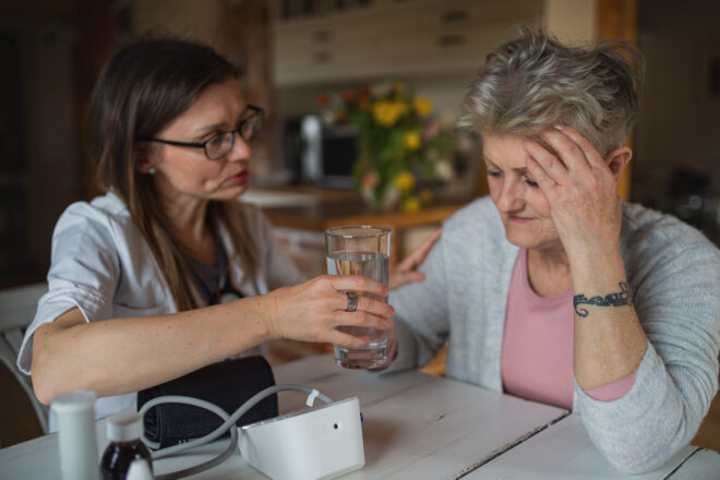 A caregiver with a disoriented and vulnerable senior, a clear example of the vulnerable state these people are in and why caregiver inheritance laws are in place.