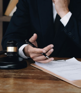 An attorney going over a case and collecting the testimonial evidence they need, which is a vital part of answering, How do you prove a breach of fiduciary duty?