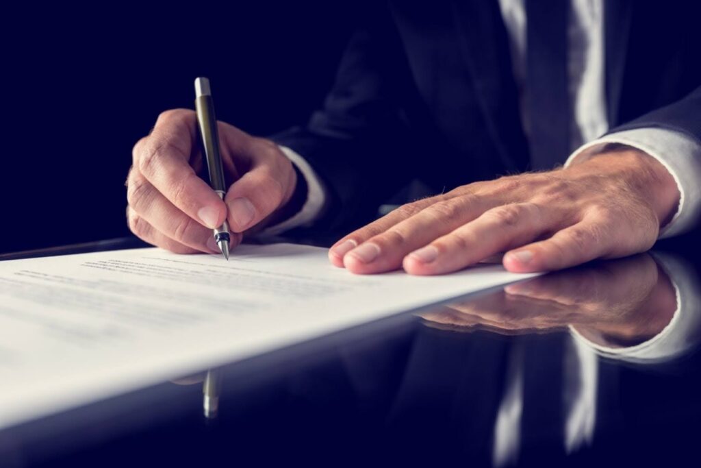 A will contest attorney going over a document to ensure it satisfies will requirements in California.