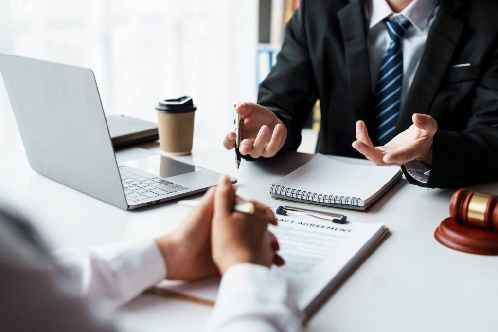 An attorney going over California trust accounting requirements with a beneficiary when reviewing an accounting provided by a trustee.