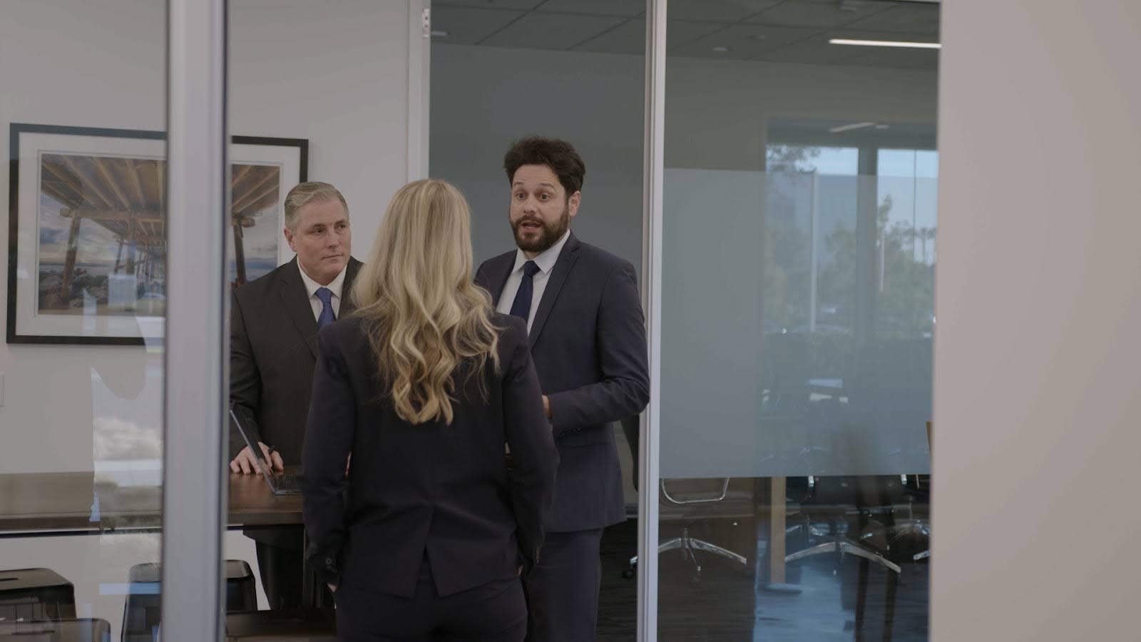Nick, Ali, and Harry discussing a case to maximize the damages a client can receive from breach of fiduciary duty penalties.