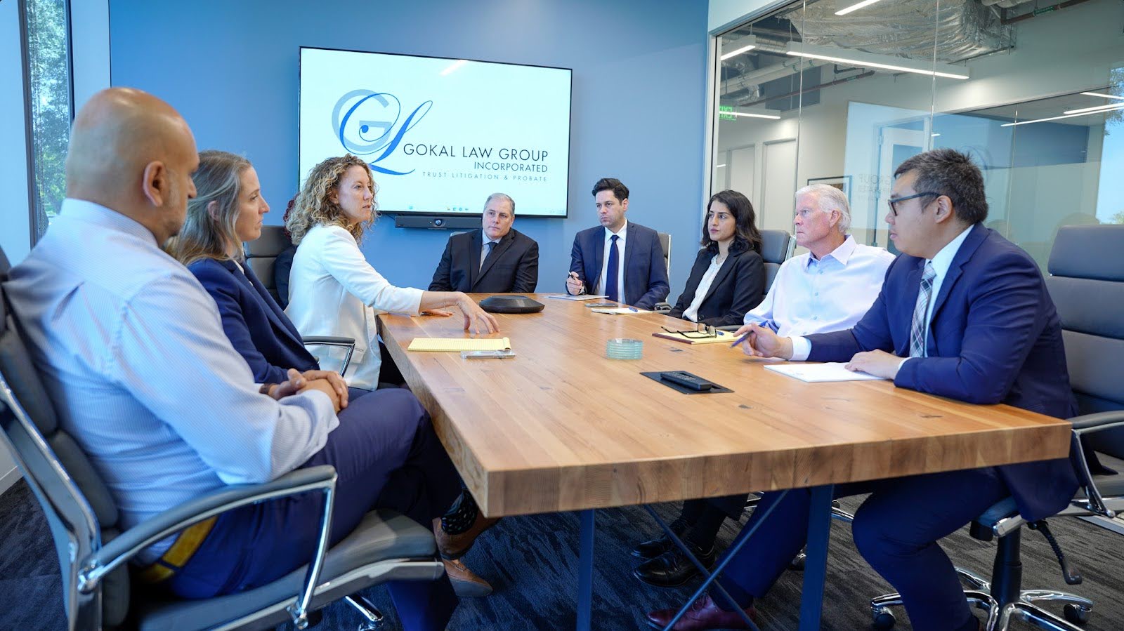 Alison talking to the Gokal Team about a case they have that involves fiduciary misconduct.